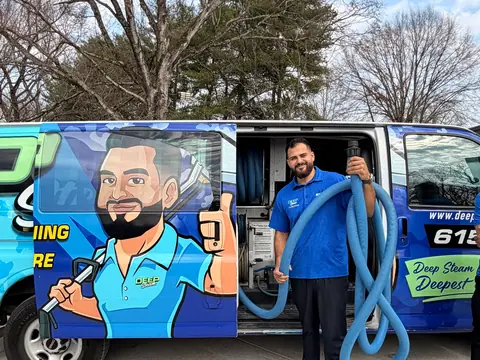 Owner Kiro with the truck-mount hose